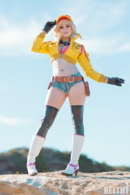 bas,botte,botte à talon,botte courte,casquette,caucasien,cheveux blond,cheveux court,cindy aurum,cleavage,corps entier,cosplay,debout,dehors,femme,final fantasy (series),final fantasy xv,gants,kayla erin,short,short en jean,soutif,talon aiguille,veste